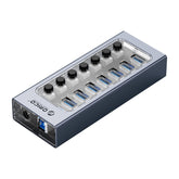 Concentrador USB multipuerto de aleación de aluminio 7 en 1 ORICO AT2U3-7AB-GY-BP con interruptores individuales, enchufe de la UE, enchufe del Reino Unido, enchufe de Australia